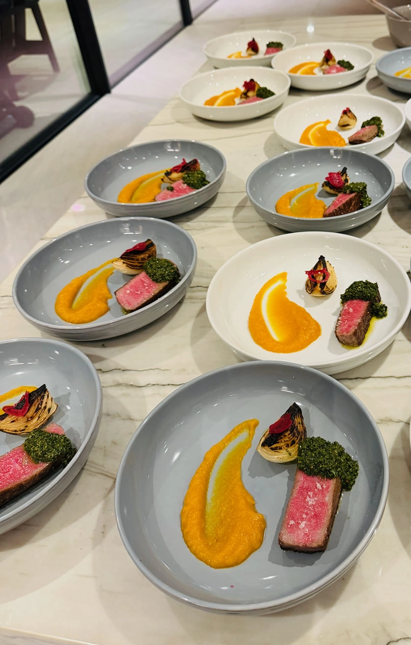 Wagyu beef with chimichurri, roasted Maui onion and vegetable purée prepared by a Maui private chef